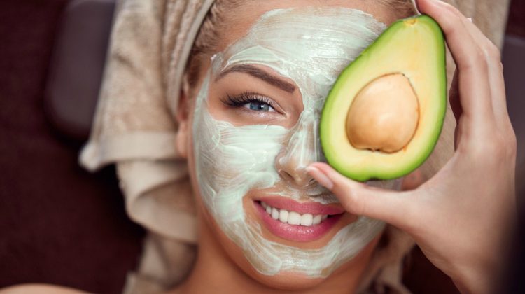 Featured | portrait of a young woman applying natural avocado mask on her face | Homemade Avocado Face Mask | Recipe