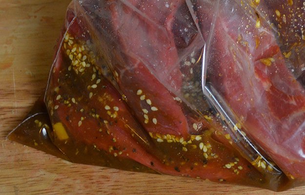 Marinade meat in resealable bag | Venison Jerky Recipe