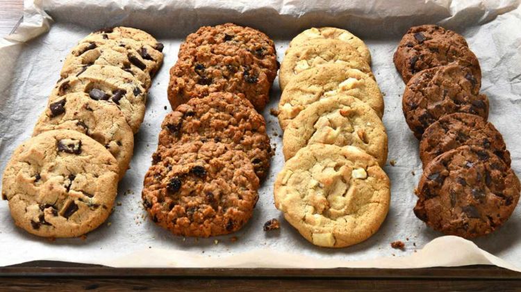 closeup tray fresh baked cookies chocolate | An Oldie But A Goodie | 18 Unforgettable Homemade Chocolate Chip Cookies | featured