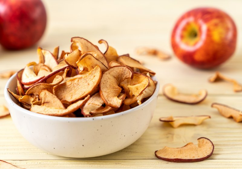 homemade dried organic apple sliced on | dehydrated fruit snacks