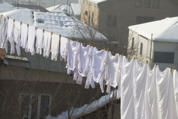Hang Shirts By The Hemline | Helpful Tips For Line Drying Clothes In Winter | Homesteading Tips