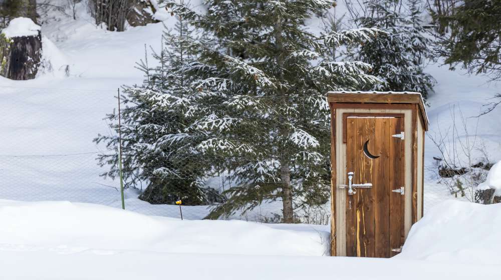 an outhouse in a wintry scene | Winterizing Your Home 101 | Prepare For Winter Months To Come | winterizing your home
