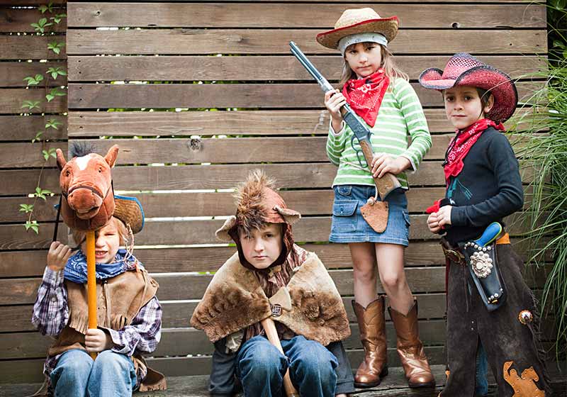 Children dressed up as cowgirl, bear and cowboys | halloween costumes
