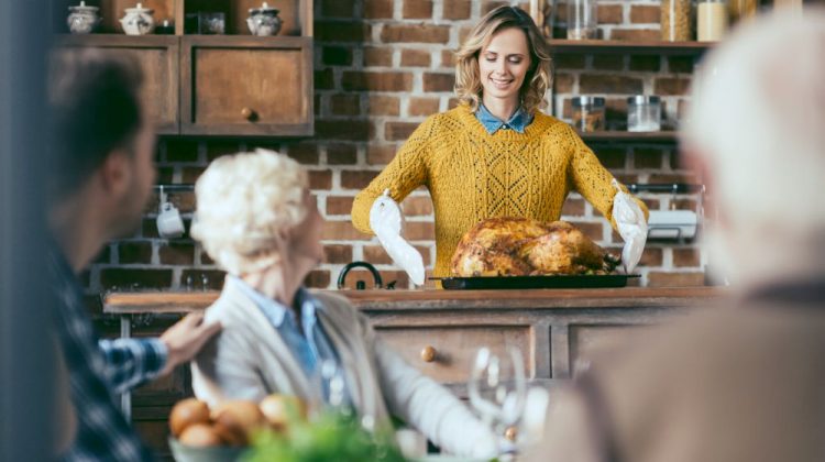 young woman holding thanksgiving turkey for dinner | Thanksgiving Recipes For Everyone At The Dinner Table | Thanksgiving Recipes | impressive thanksgiving recipes | Featured