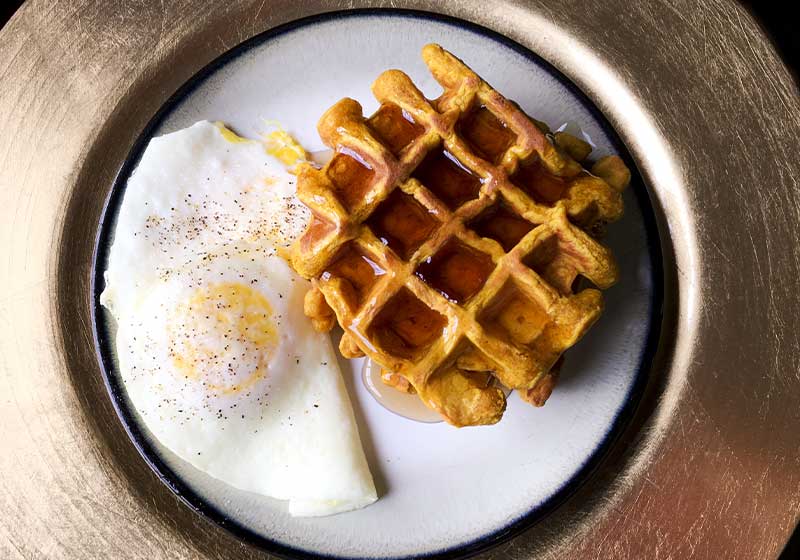 Home made pumpkin waffles and one egg over easy on Golden Plate | pumpkins