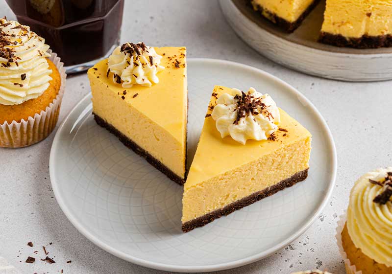 Pumpkin cheesecake with chocolate base layer and cream frosting | pumpkin fall recipe