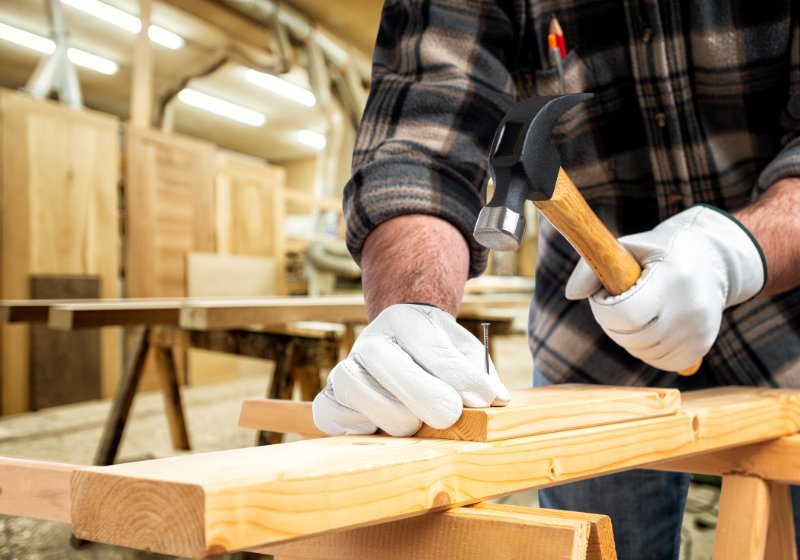 close carpenter his hands protected by | how to learn basic carpentry skills