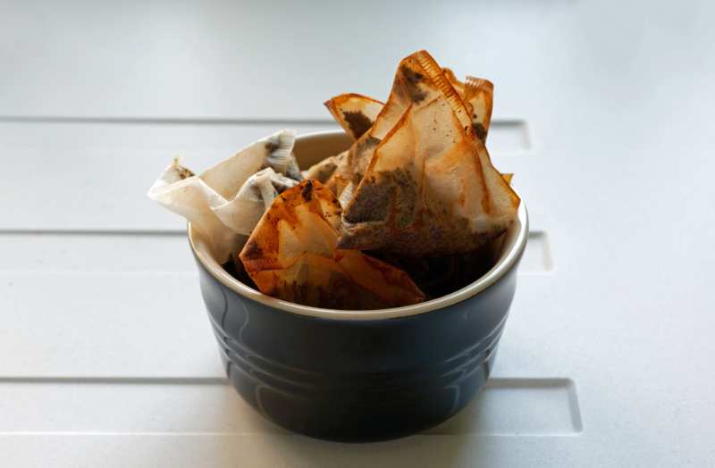 used-teabags-bowl-on-draining-board