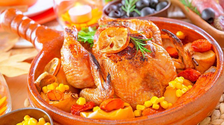 Closeup on delicious prepared thanksgiving turkey baked with vegetables | Classic Pioneer Woman Recipes For Thanksgiving | Featured