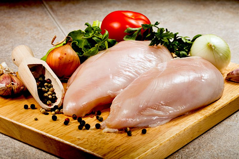 Raw Chicken Breasts Cutting Board | A Step-by-Step Guide To Canning Chicken Safely At Home