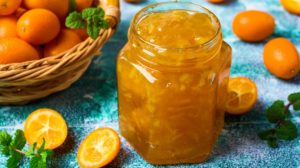 Jam from kumquat with rind in glass on a wooden background | Best Kumquat Marmalade Recipe You Can Easily Make At home | kumquat recipes | Featured