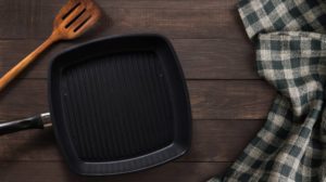 cast-iron-griddle-pan-turner-wood | How To Season A Cast-Iron Griddle | Featured