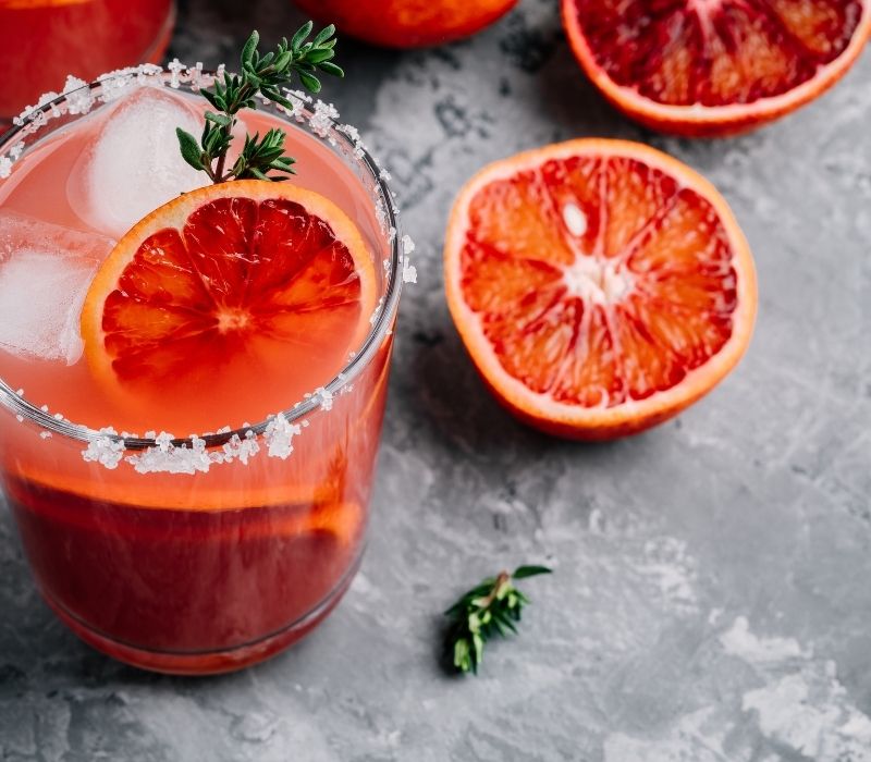Blood Orange Margarita cocktail with ice and thyme | cocktail recipes