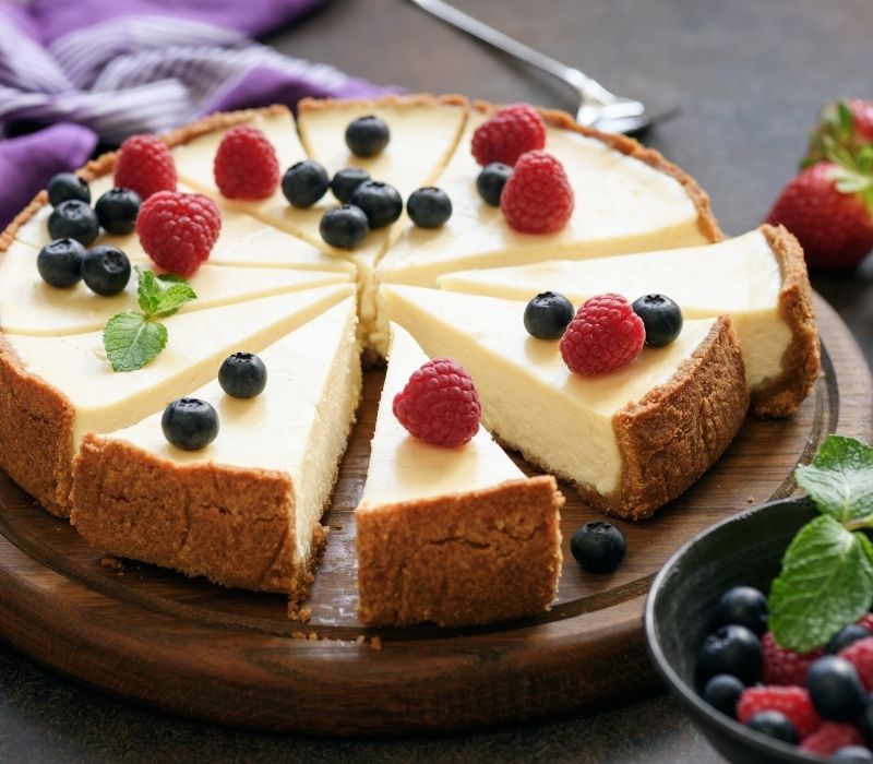 Classic plain New York Cheesecake sliced| traditional thanksgiving menu ideas