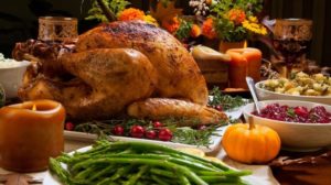 Roasted turkey garnished with cranberries | Thanksgiving Menu Ideas For Homesteaders | Featured