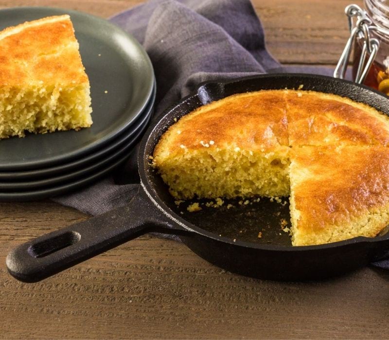 Sweet cornbread with honey on the plate| vegan thanksgiving menu ideas
