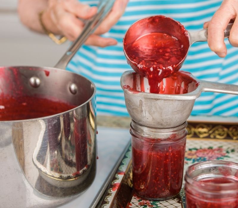 Woman filling jars with raspberry jam | Water Bath Canning | Easy Step by Step Guide