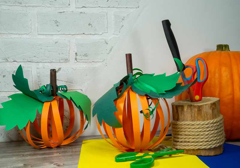 Halloween handicraft concept making homemade decorations from colorful paper | thanksgiving table decor