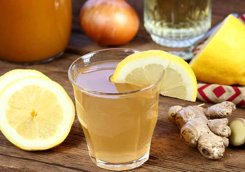 Hot tea against cough and flu made from onion, ginger, lemon and honey | how to stay warm in winter