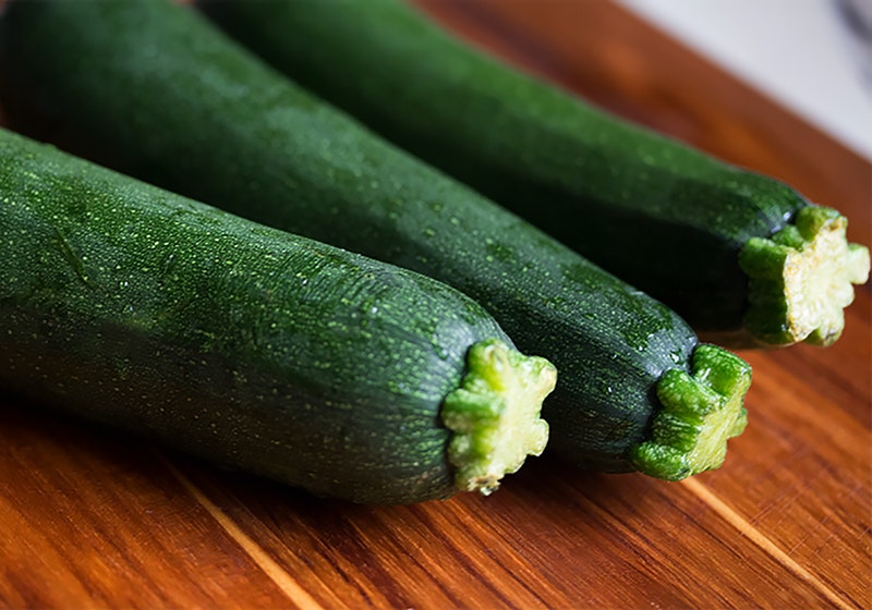 3-zuchini-brown-wooden-surface | zucchini vegetables