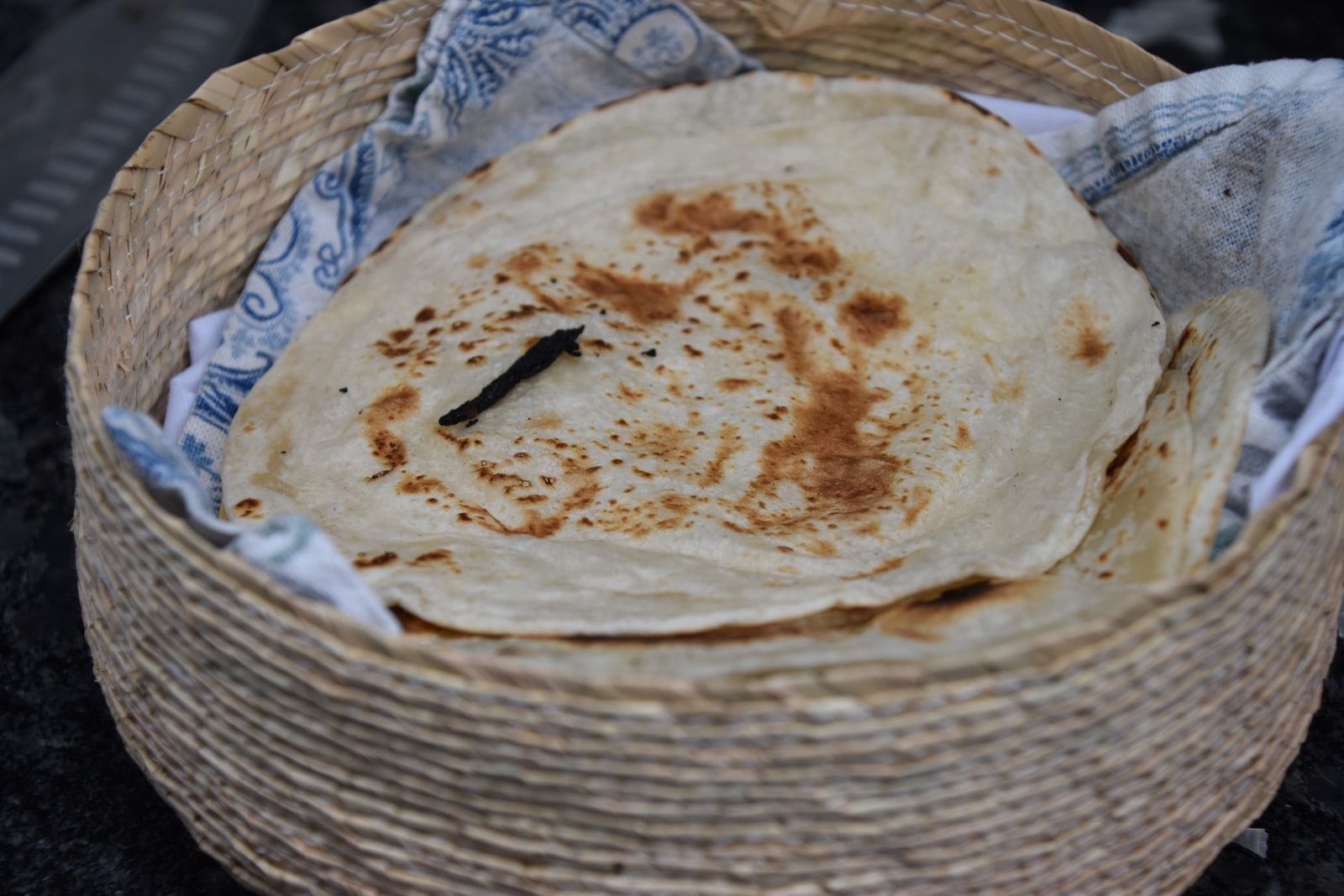 Spinach Tortilla on white wicker basket