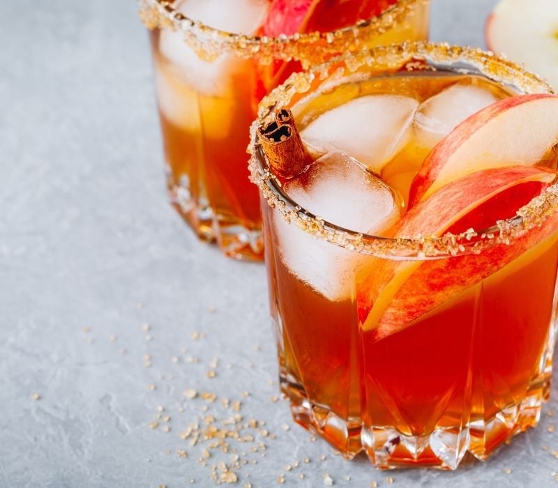 Apple cider margarita with cinnamon and ice | ## Halloween Punch Recipes To Serve At Your Home Party