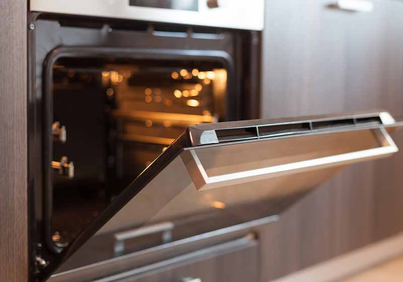 Empty open electric oven with hot air ventilation | cold weather hacks