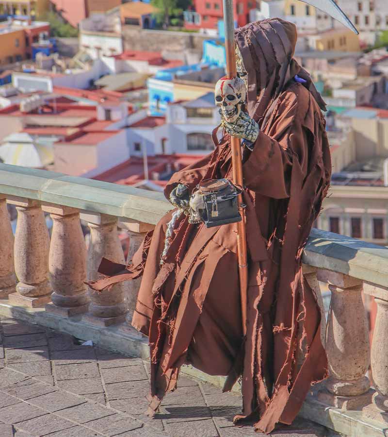 Grim Reaper Sitting on the Edge of speak | halloween costume ideas