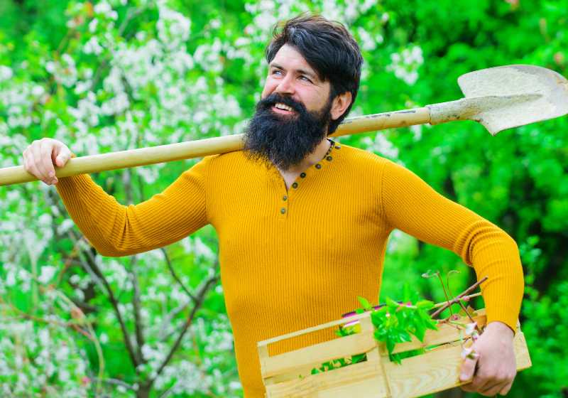 Happy man preparing to planting | Off the Grid Hacks You Need to Know