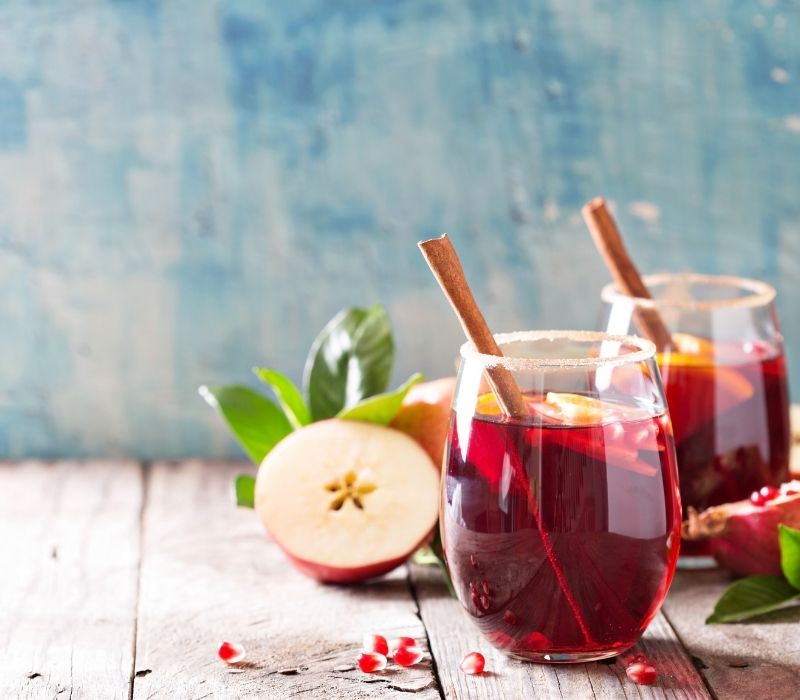 Sangria with apples oranges pomegranate and cinnamon | ## Halloween Punch Recipes To Serve At Your Home Party