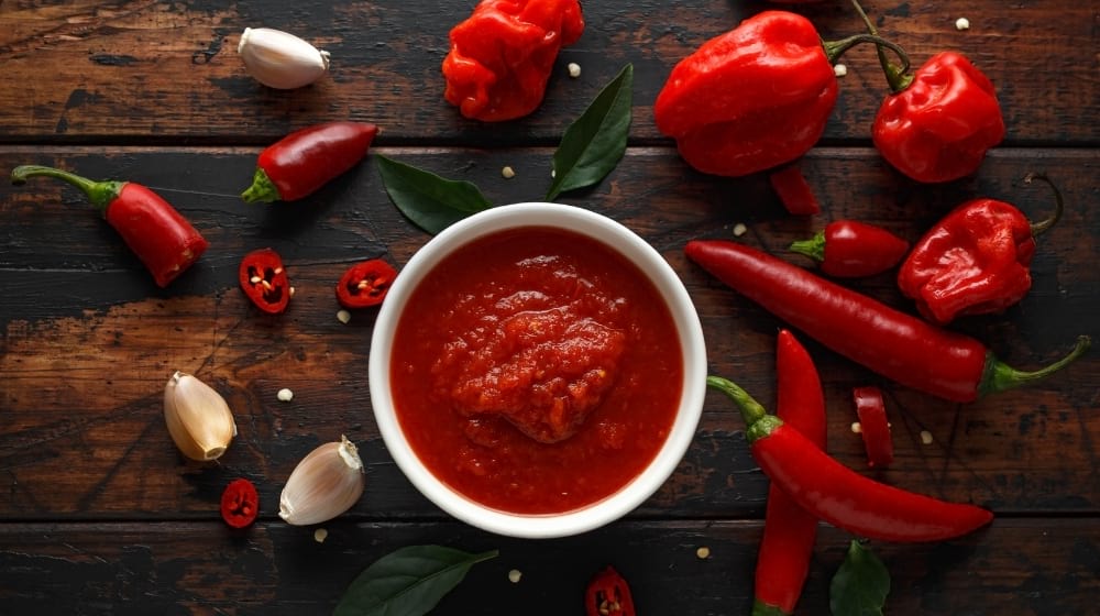 Spicy hot chili sauce with_mix of chilli pepper garlic | Easy Homemade Hot Sauce Recipe | Featured
