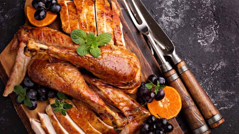 carved turkey on cutting board thanksgiving | How to Carve a Turkey The Right Way | featured