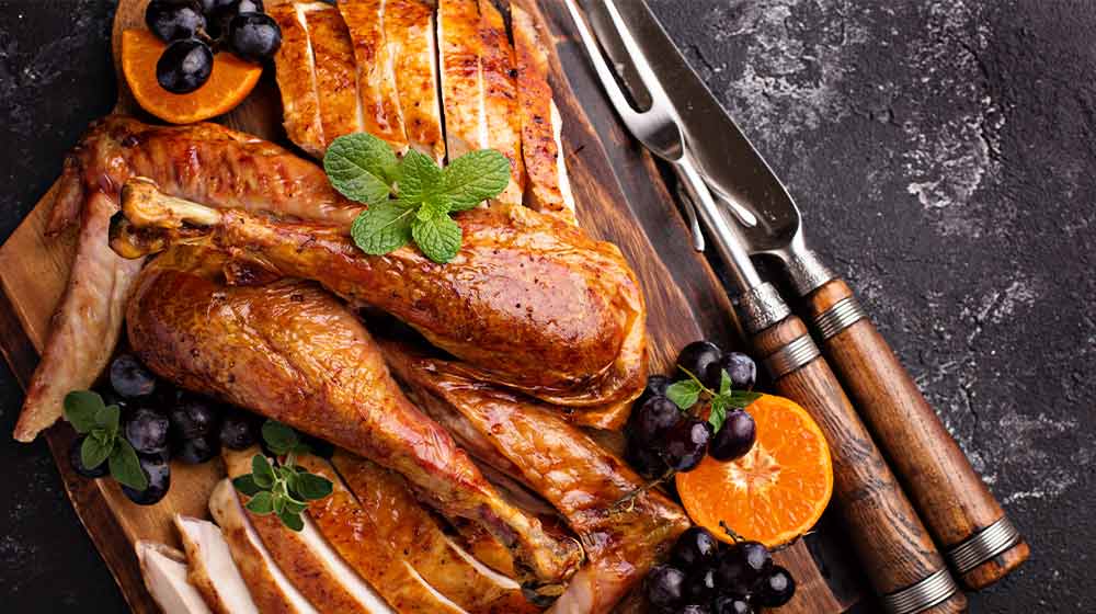 carved turkey on cutting board thanksgiving | How to Carve a Turkey The Right Way | featured