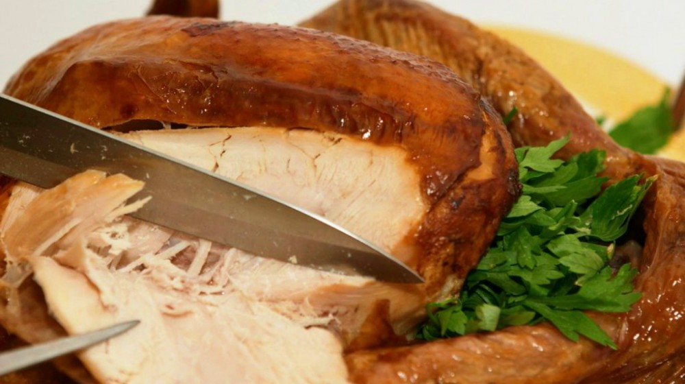 Carving the festive turkey | How To Cook A Turkey Perfectly For Thanksgiving | best way to cook a turkey | Featured