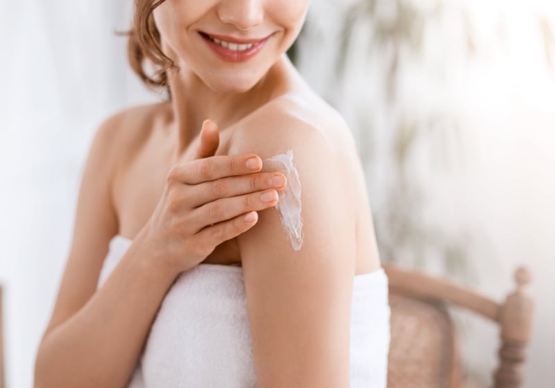 closeup young woman wrapped towel applying | is glycerin safe