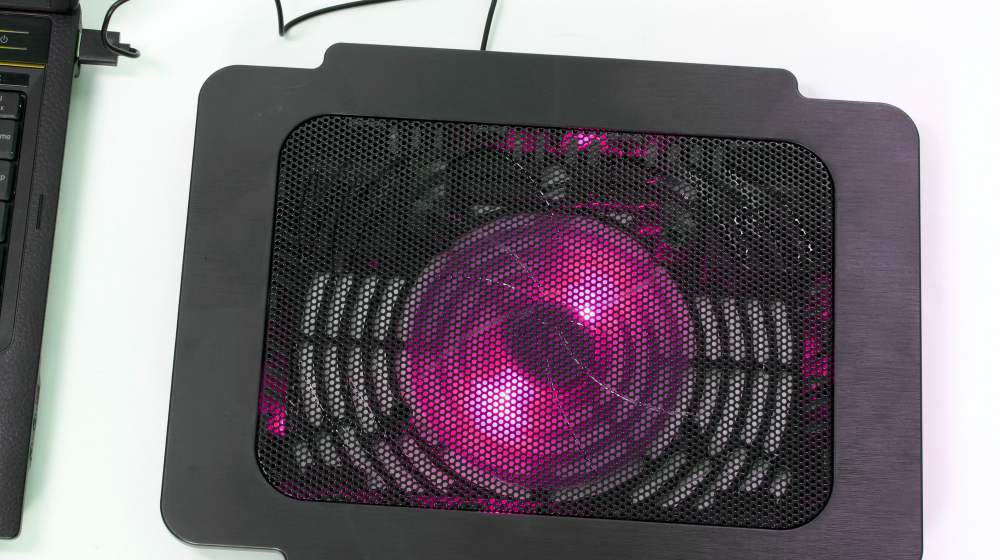 cooling pad for laptop computer isolated on white background | Why Is My Laptop Slow? (And How To Fix It On A Budget) | why is my laptop slow