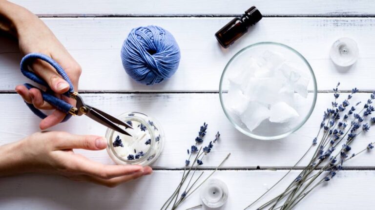 handmade-candles-lavender-on-wooden-background | Stress Relieving Lavender Candles You Can Make At Home | Featured