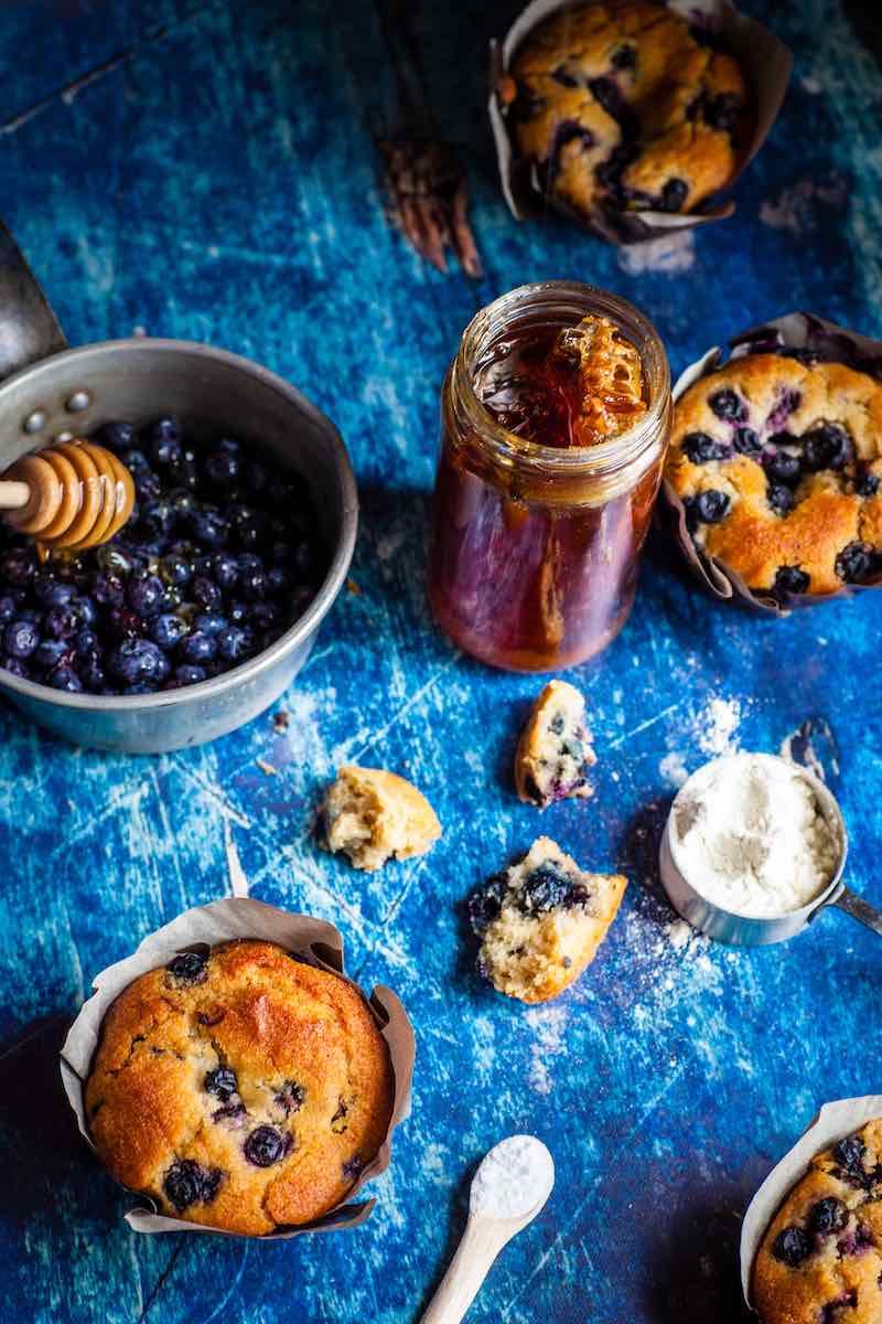 l1eWD3DrmcQ blueberries on gray bowl and muffins | canning blueberries