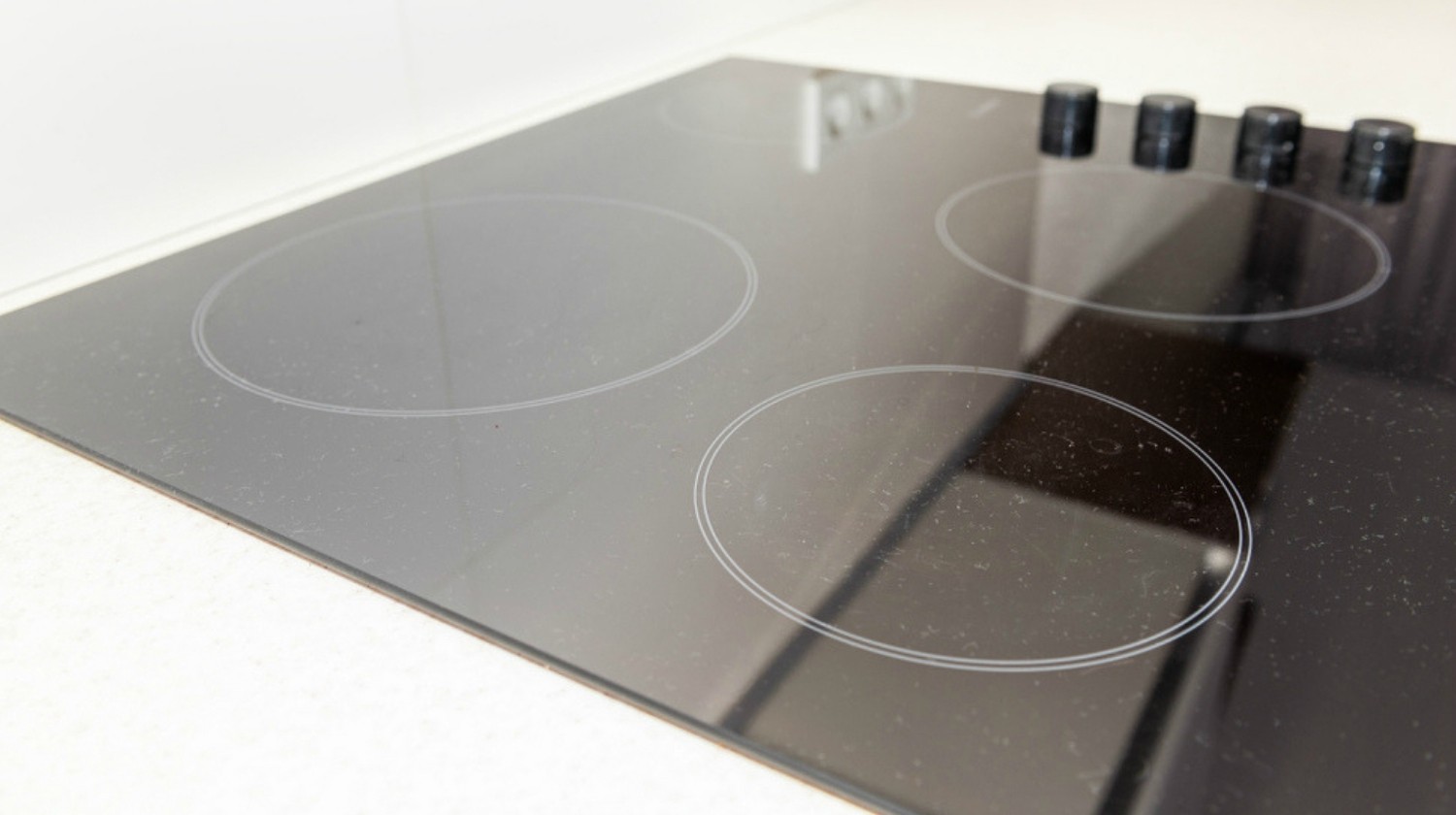 Featured | Macro closeup of modern luxury electric cook stove top | DIY Stovetop Cleaner