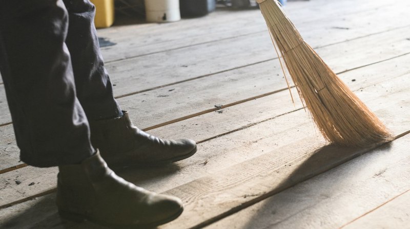 person sweeping the floor | Homesteading Activities You Should Do This Spring | spring activities | fun spring activities