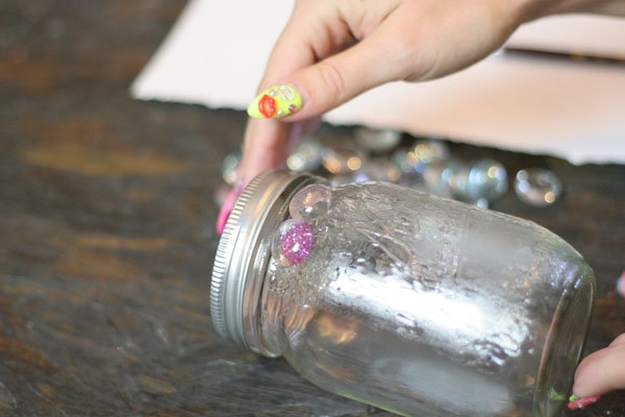 Apply glass elements to jar working from top down.