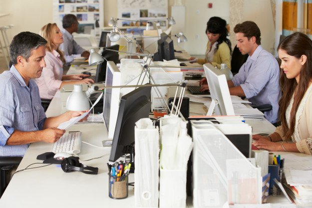 people-working-in-office Homesteads and Skyscrapers | Country Folk vs City Dwellers