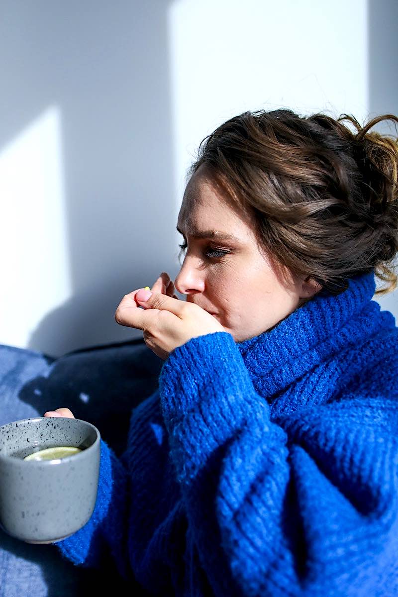 Person Taking Pill | Ultimate Pandemic Surival Tips For Homesteaders