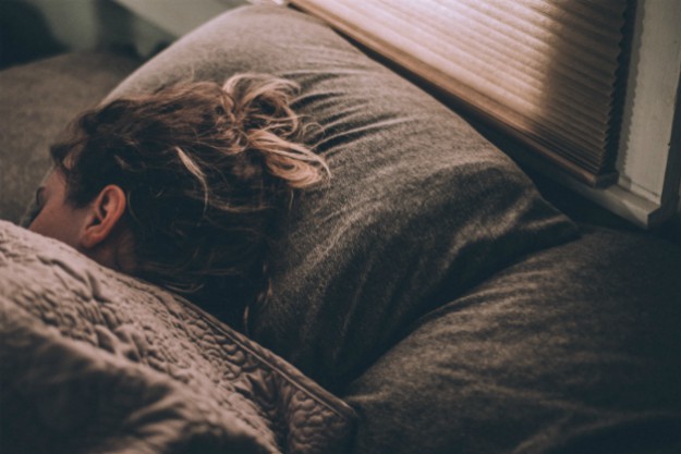 Sleeping woman | Natural Ways To Boost Your Mood
