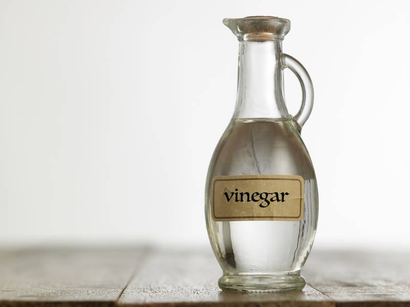 white-vinegar-on-wooden-table-top | How To Get Rid Of Chiggers Naturally: The Ways and Whys