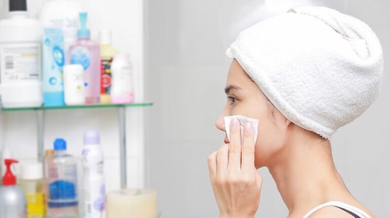 Woman Applying Cosmetic Cream in Bathroom | How To Make Zero-Waste Reusable Cotton Pads In Your Homestead | Featured