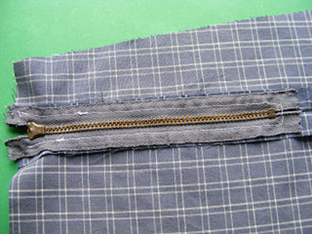 Place Zipper Face Down Over Fabric | How To Sew A Zipper 101: A Simple Step-by-step Guide